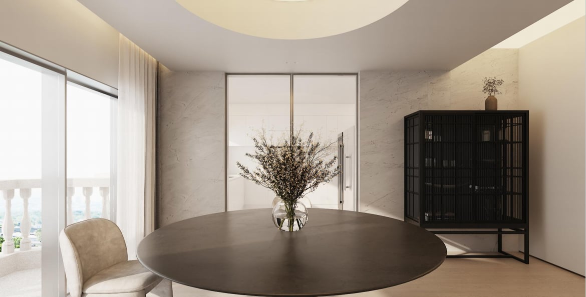 Circular dining room beneath a soft ceiling light