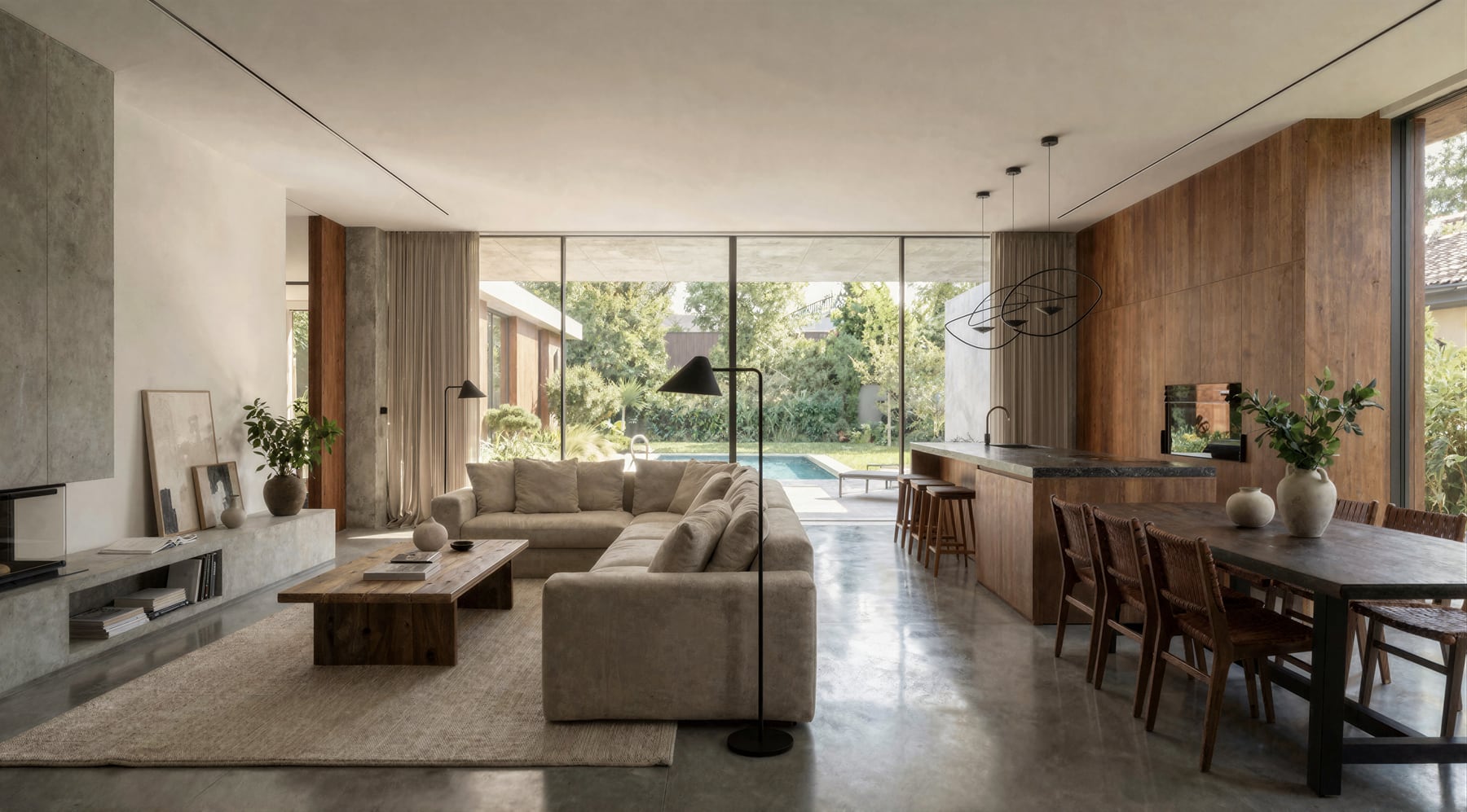Open living and dining room connected to the landscape